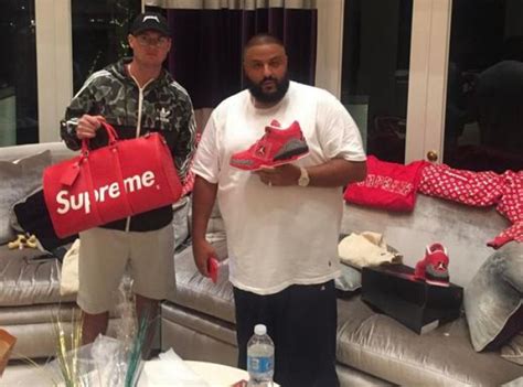 dj khaled picks up the louis vuitton supreme|DJ Khaled Wearing a Louis Vuitton x Supreme & Jordan Outfit.